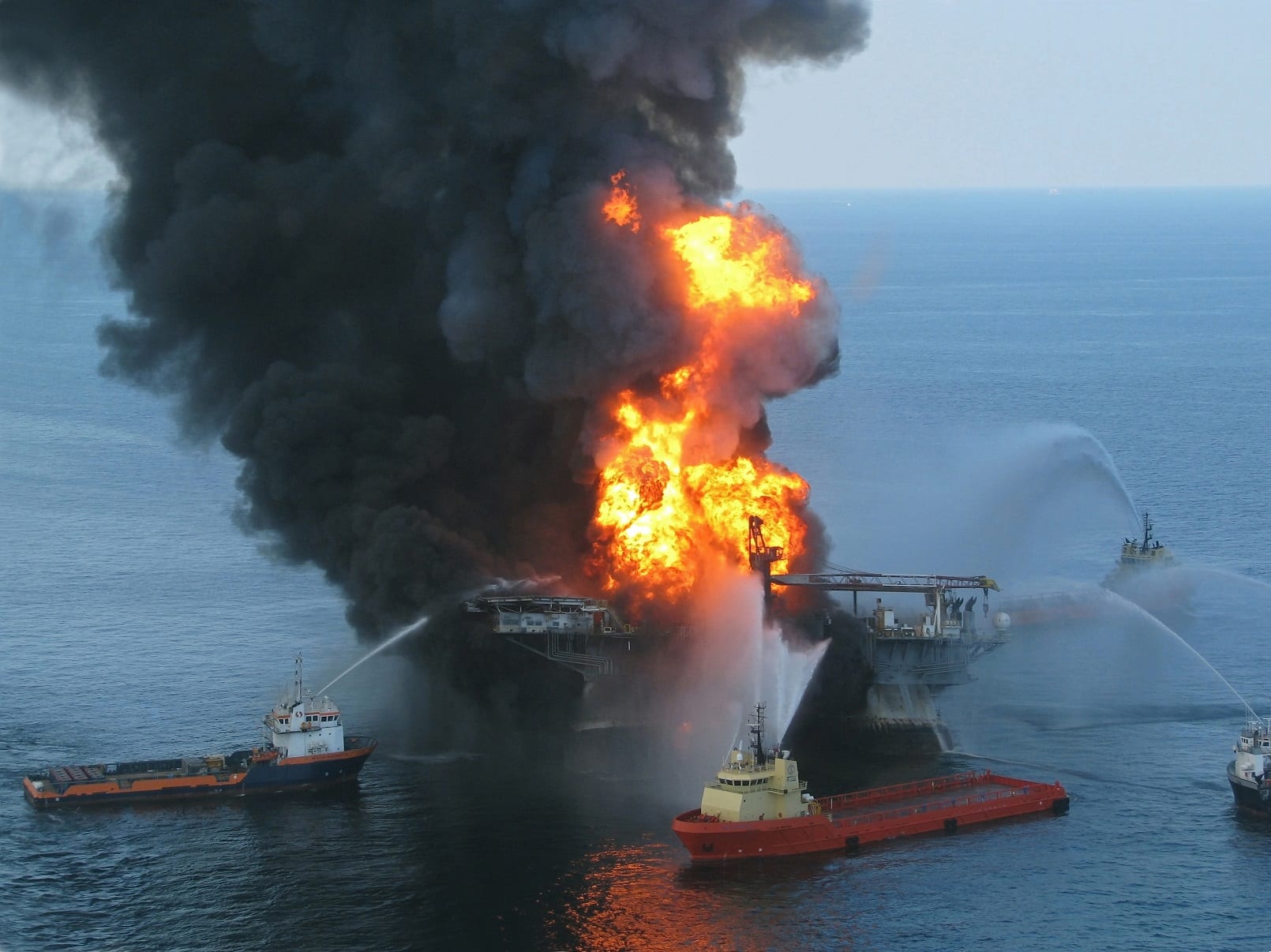 The U.S. Coast Guard fights to put out the Deepwater Horizon fire.